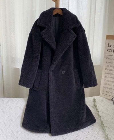 Manteau long en fausse fourrure avec revers et poches